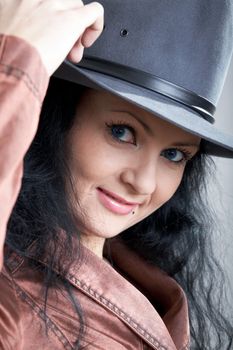 An image of nice woman in grey hat