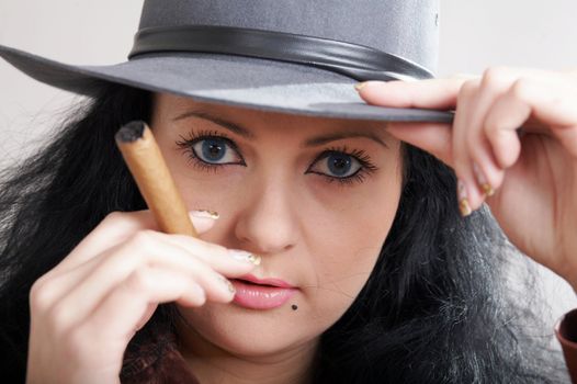 An image of a girl in felt hat