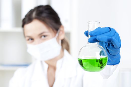 chemist working in laboratory with scientists equipment