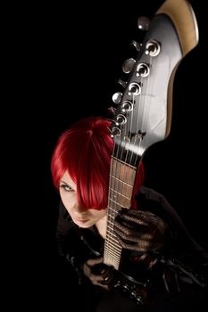 Rock star with guitar, selective focus on guitar, high angle view 