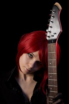 Gothic girl wearing scary contacts, isolated on black background  