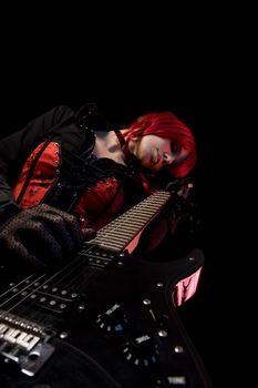 Gothic guitar player, low angle view, focus on fingers, low angle view  