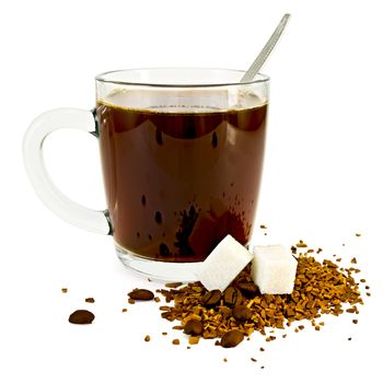 Coffee in a glass mug, a spoon, grains and granules of coffee on a table with two lumps of sugar isolated on white background