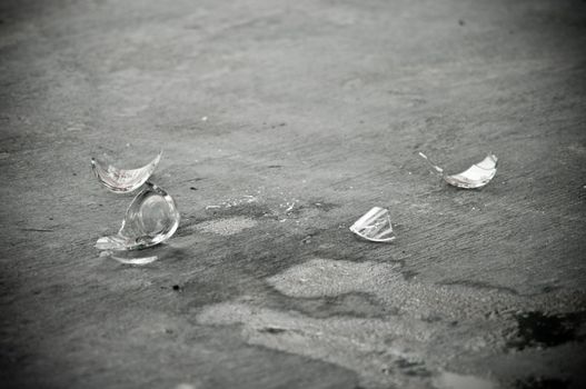 Broken glass on ground, Broken relationship concept