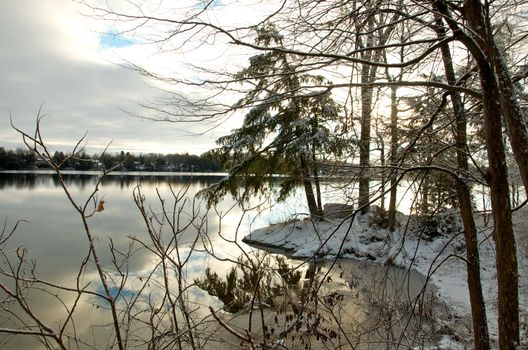 This image of Otter Lake was made at dawn on Christmas day in Eastern Ontario, Canada.
