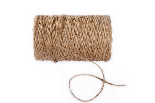 Industrial twine clew on a white background