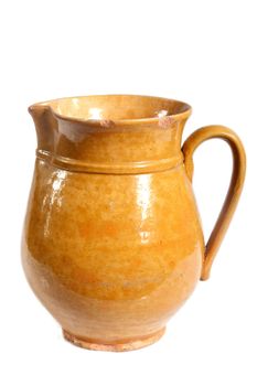 old clay jug on a white background