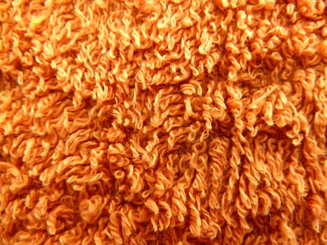 closeup on a section of bright orange fabric