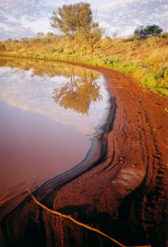 Heavy rains in the winter of 2000 filled this pond in the Australian outback to capacity.