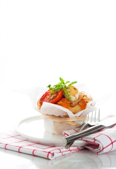 Fresh pizza muffin as a snack on white background as a studio shot