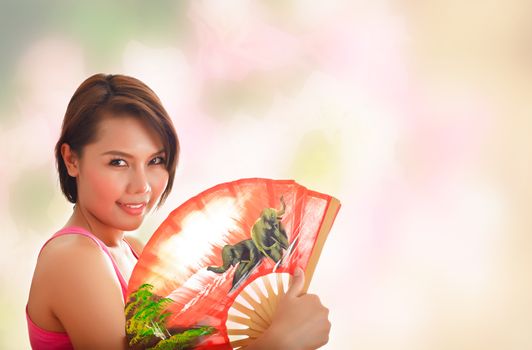 A beautiful young asian woman as a studio shot
