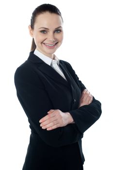 Portriat of corporate lady posing with folded arms isolated over white, smiling