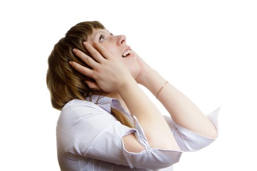 young girl looks up in horror on a white background