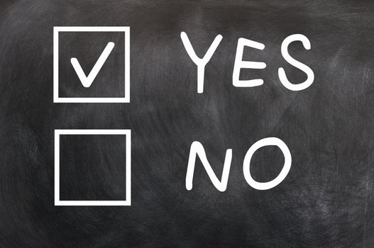 Check boxes of Yes and No with yes checked on a blackboard