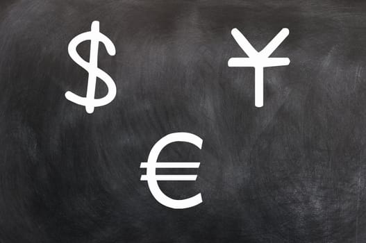 Chalk drawing of money symbols on a blackboard