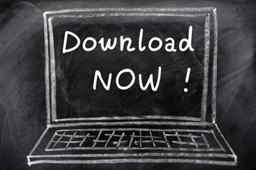 Download now written with chalk on a blackboard,with a chalk-drawing of laptop