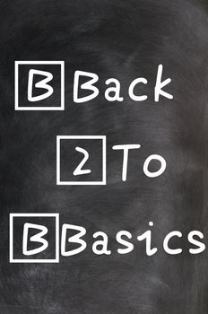 Acronym of B2B for Back to Basics written with chalk on a blackboard