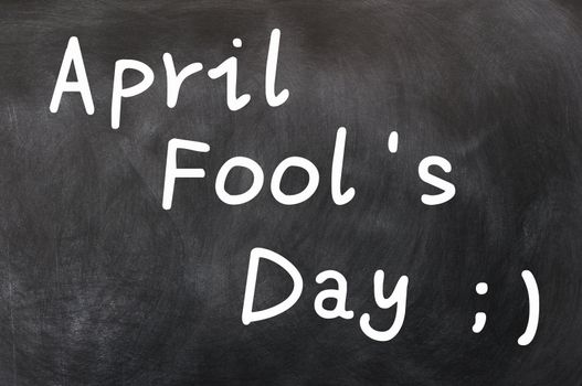 April Fool's Day written with white chalk on a blackboard
