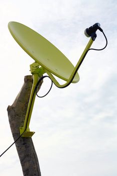 Yellow Satellite Dish isolated on White sky in Thailand