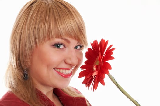An image of green-eyed woman in red with flowers