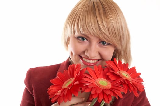 An image of green-eyed woman in red with red flowers