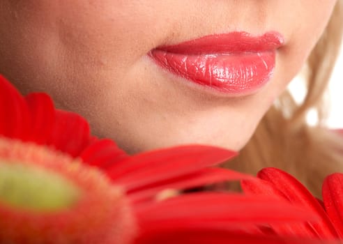Lips with red flowers isolated