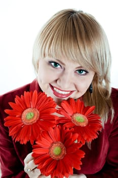 An image of nice woman with red flowers