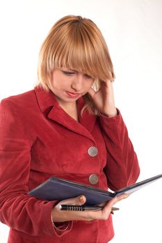 An image of a reading woman in red suit
