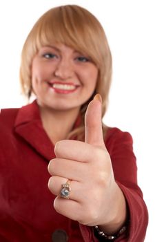 An image of girl in red suit. Showing his thumb.