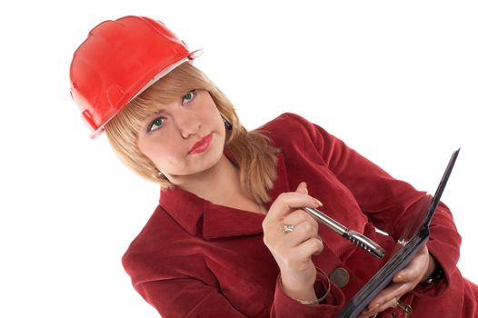 A woman in a helmet keeping a notebook with a pen