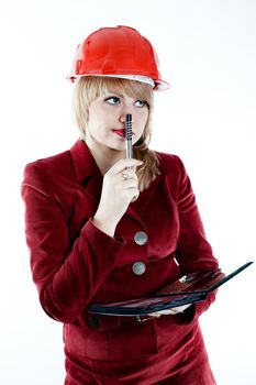 An image of a businesswoman in red helmet