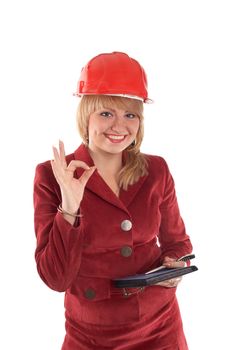 A businesswoman in a helmet showing sign "OK"