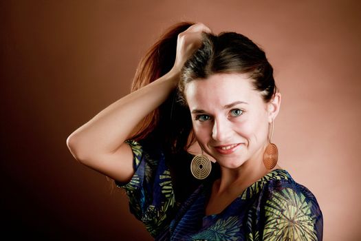 An image of a beautiful girl in a violet dress