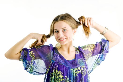 An image of a young funny girl in a violet dress