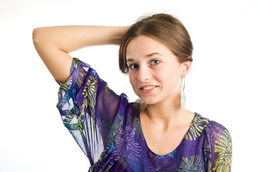 An image of a young girl in a violet dress