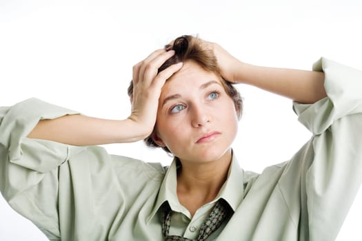 A portrait of a girl with her hands on her head