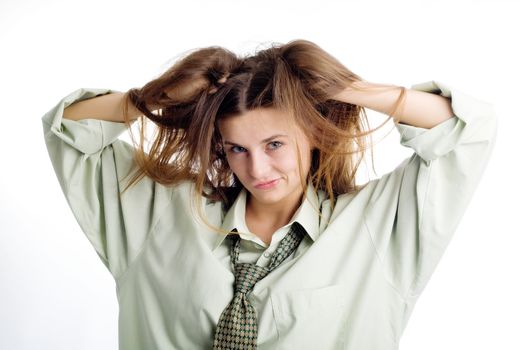 An image of a dissatisfied girl tearing her hair
