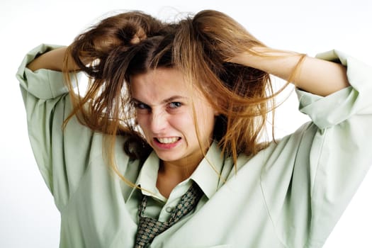 An image of an angry girl tearing her hair