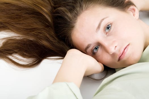 An image of a beautiful young girl with long hair