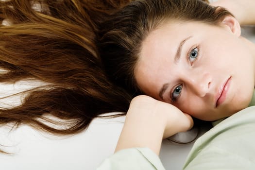 An image of a beautiful young girl with long hair