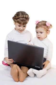 Stock photo: an image of two nice girls with laptop