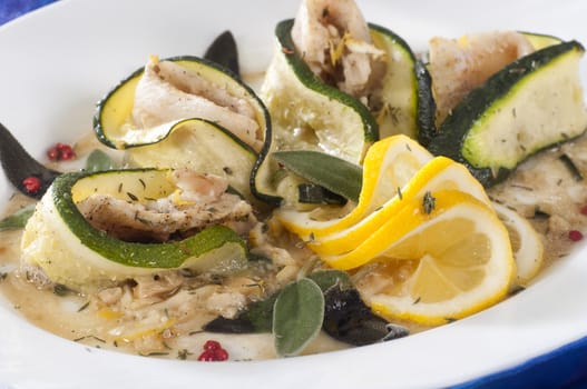 Fish cutlet with zucchini and orange