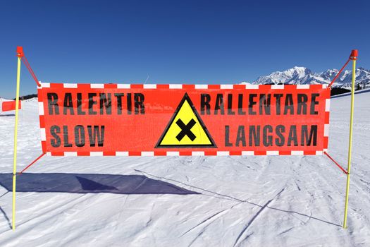 danger panel on ski track in winter