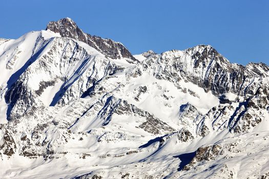 french alpine mountain with snow in winter
