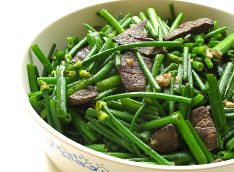 Pork Liver Stir Fried With Flowering Garlic Chives on white background