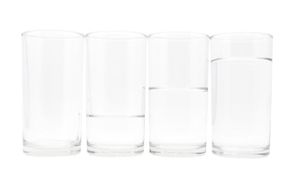 Four glasses with three level of water on white background