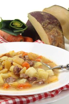 a plate of turnip stew with parsley and cook meat