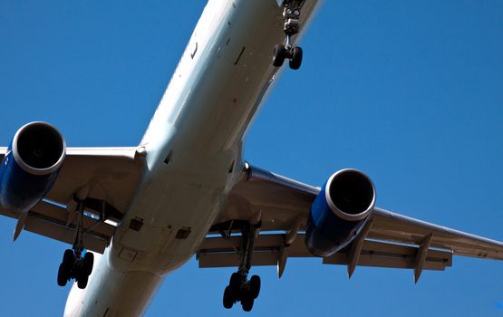 airplane wheels and lights in view from land 