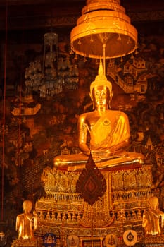 Sitting Buddha Gold Statue in Buddhist Temple. Wat Pho, Bangkok, Thailand