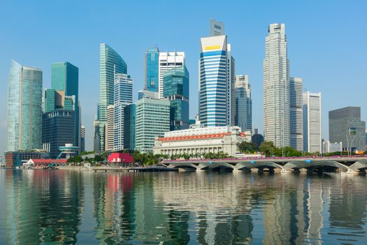 Singapore business district skyscrapers and Marina Bay in day